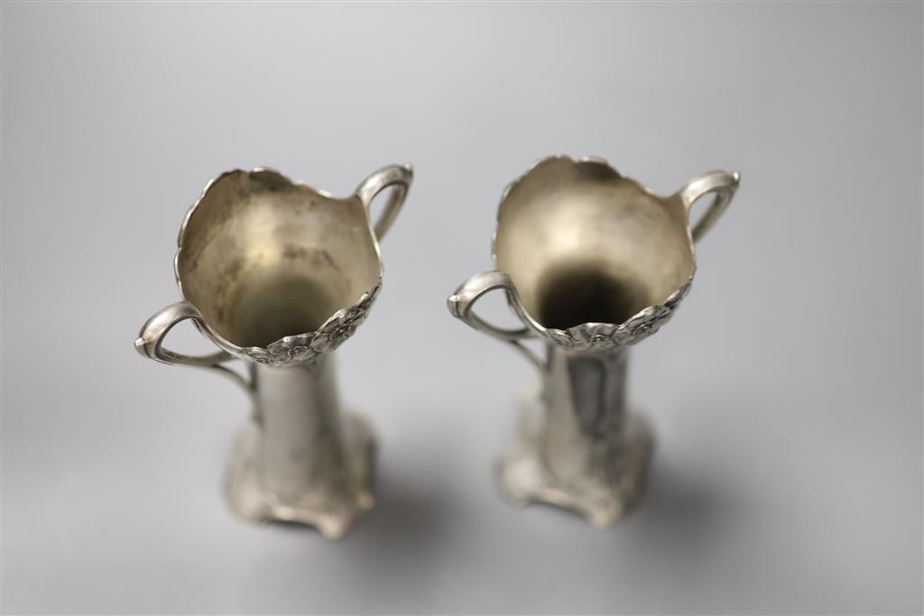 A pair of WMF two handled vases, both missing glass liners, height 13.5cm
